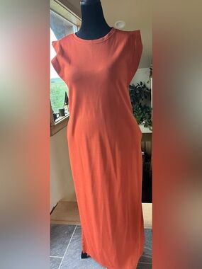 Orange dress, slim fit, perfect for dinner date.